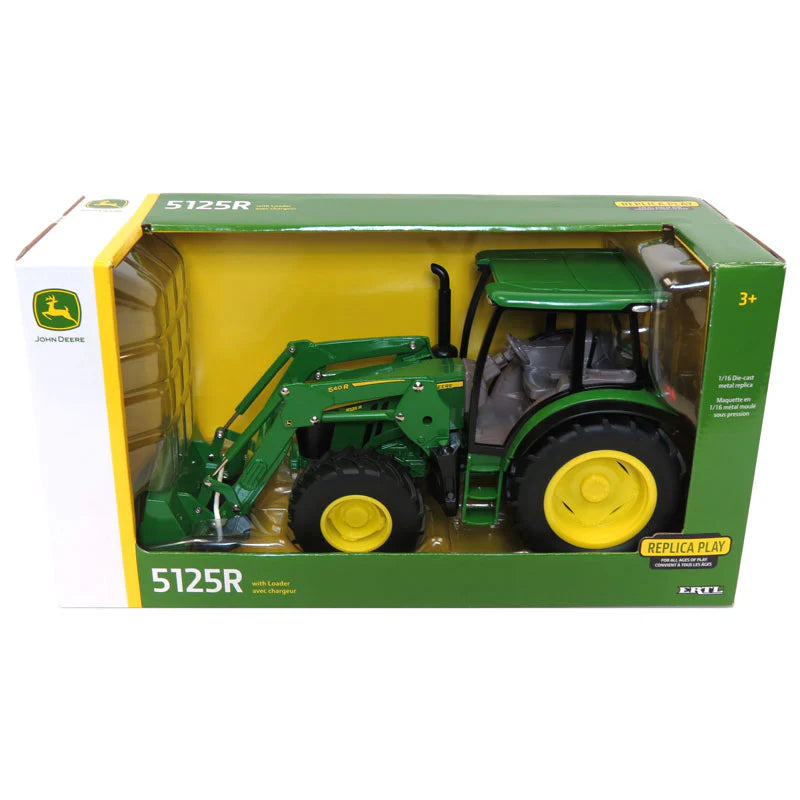 John Deere toy tractor in packaging with visible branding