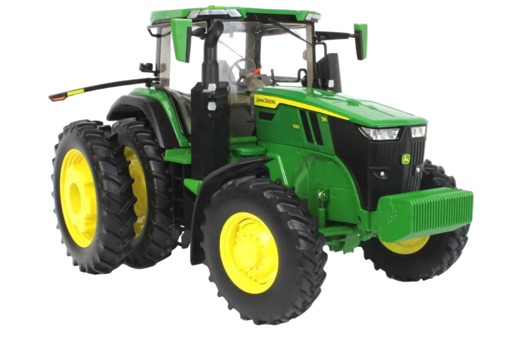 Toy tractor with green body and yellow wheels on a white background